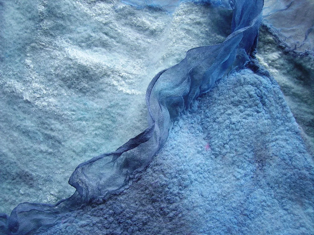Nuno felt made on a fine open-weave fabric