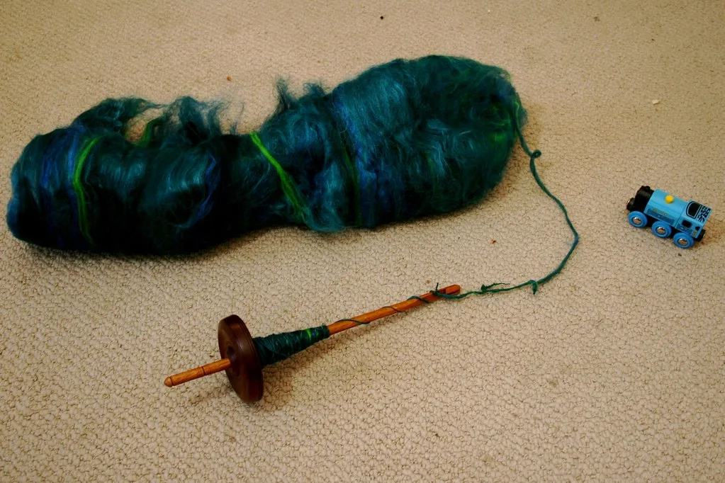 A carded wool batt of the kind used for cores