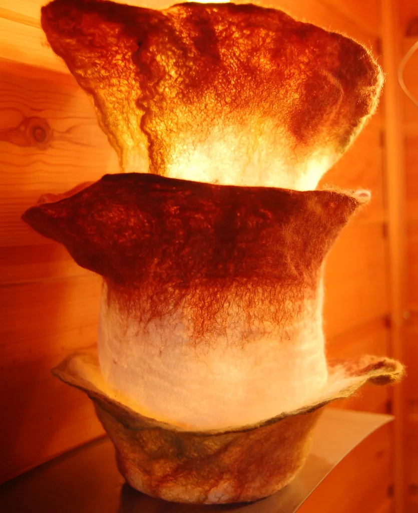 A wet felted vessel made seamlessly over a resist