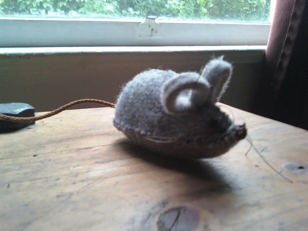 A handmade felt catnip mouse