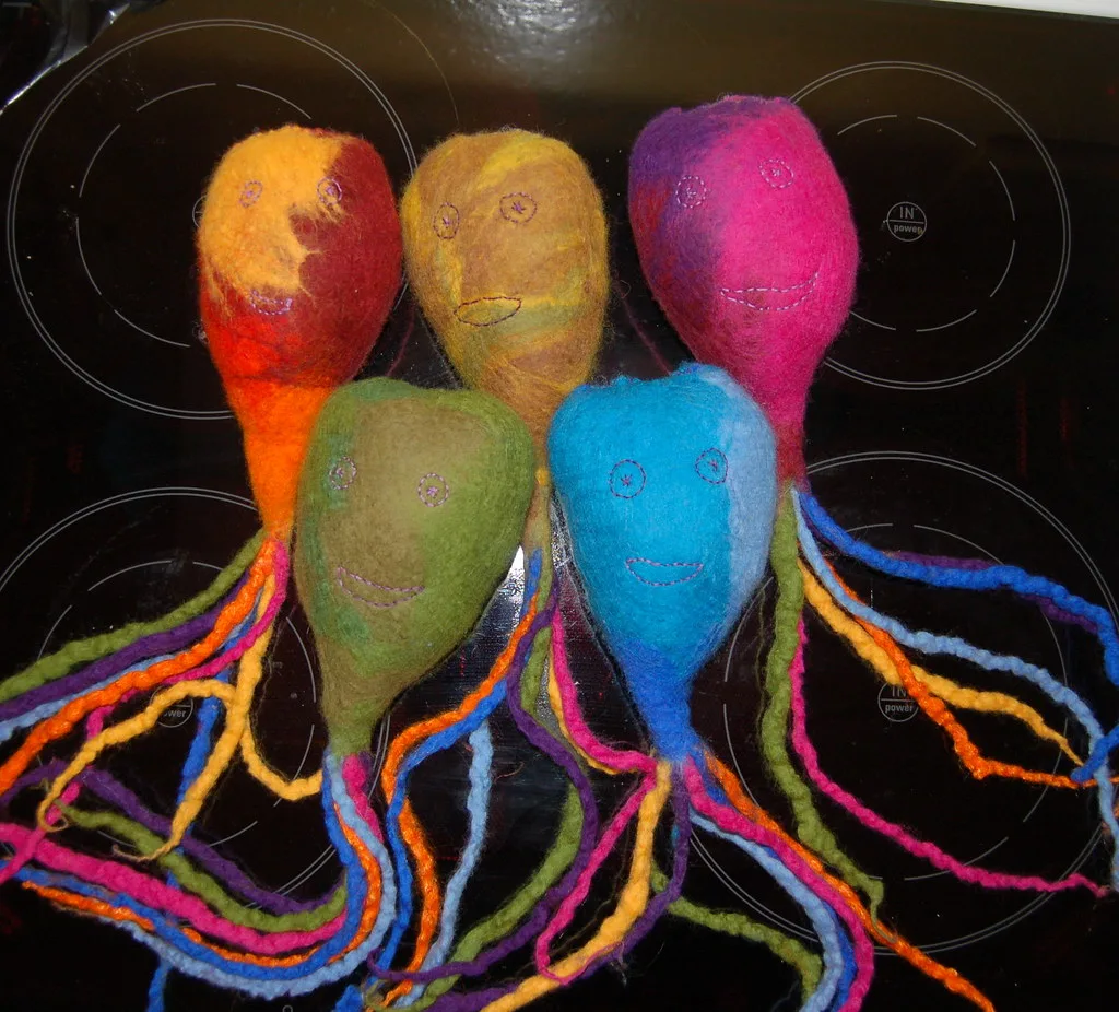 Felt octopus toys with embroidered faces