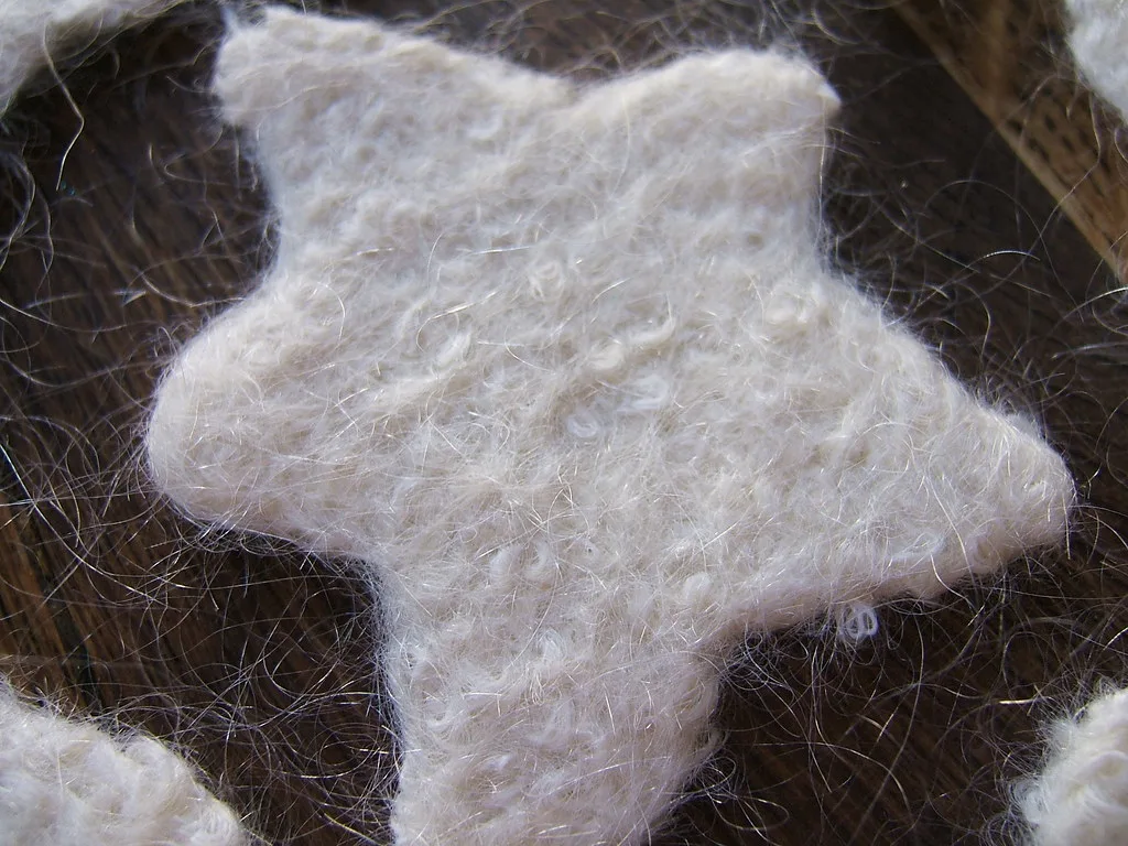 Knitted wool photographed after felting, with the stitches closed up