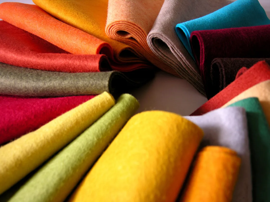 Sheets of wool felt in several colours stacked together