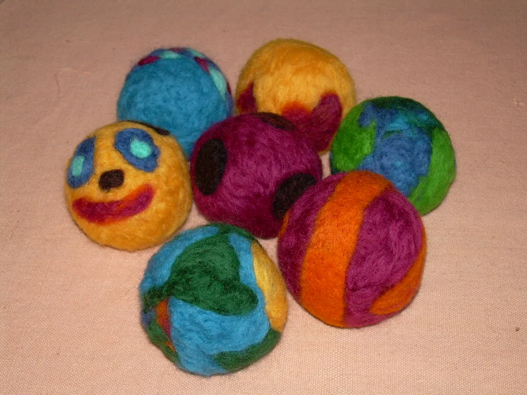 Firm felted wool balls, the shape most beginner kits start from