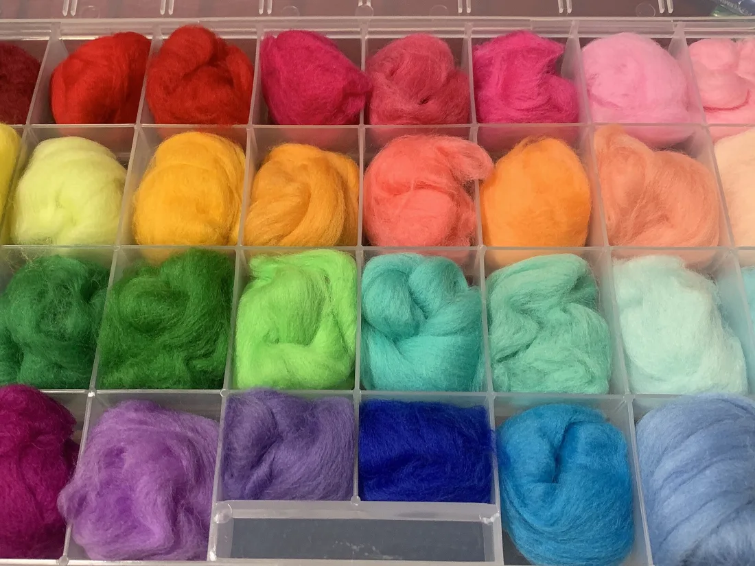 Undyed wool roving of the kind used for the core of a sculpture