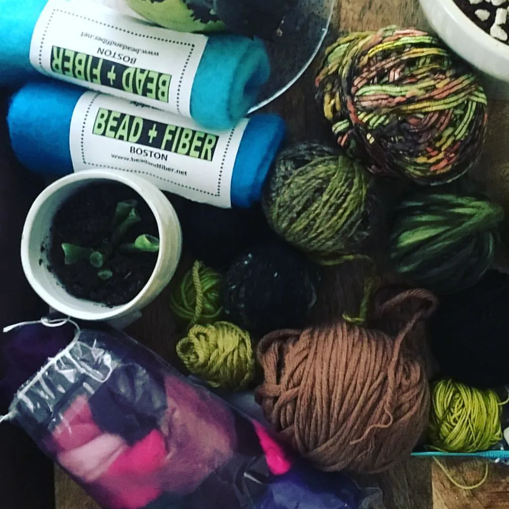A display of wool fibre in many colours at a fibre shop