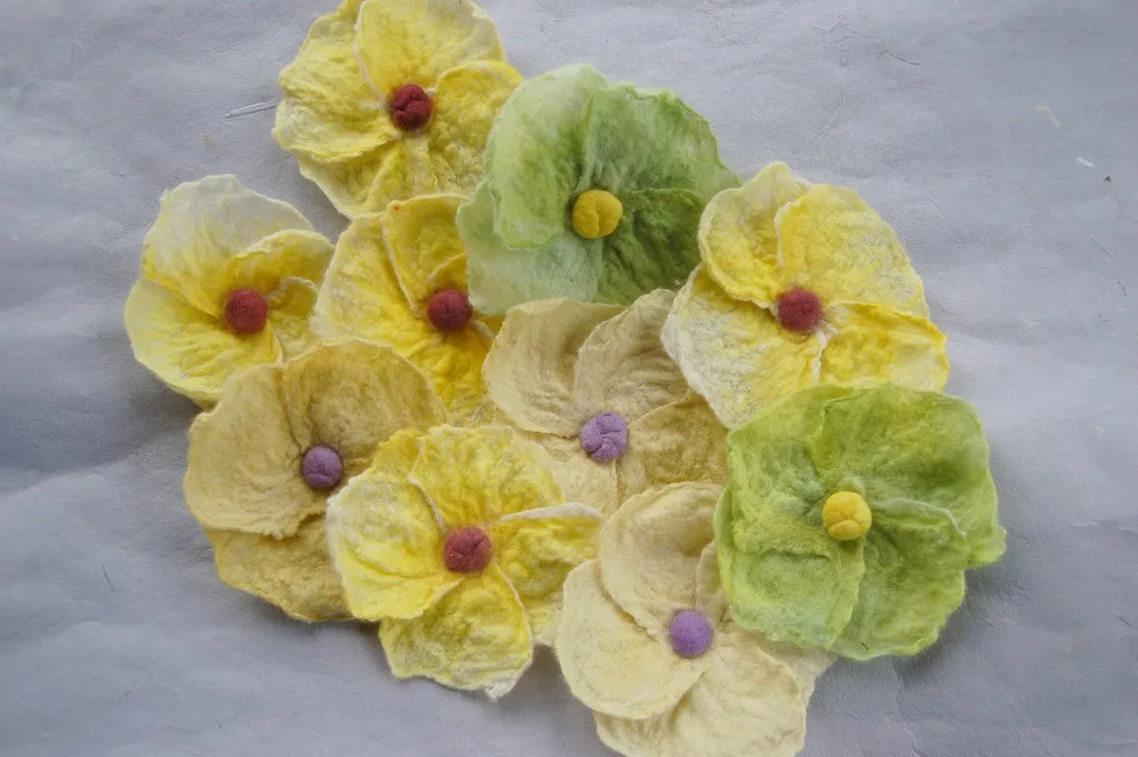 A bunch of felted wool flowers