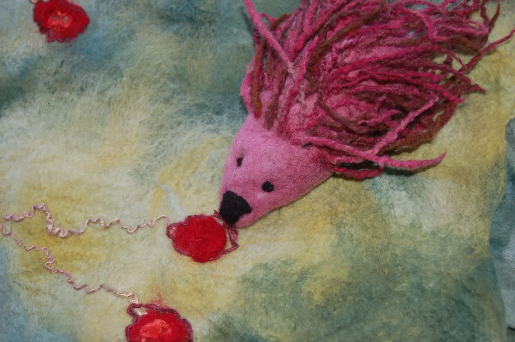 A stylised felted hedgehog in wool