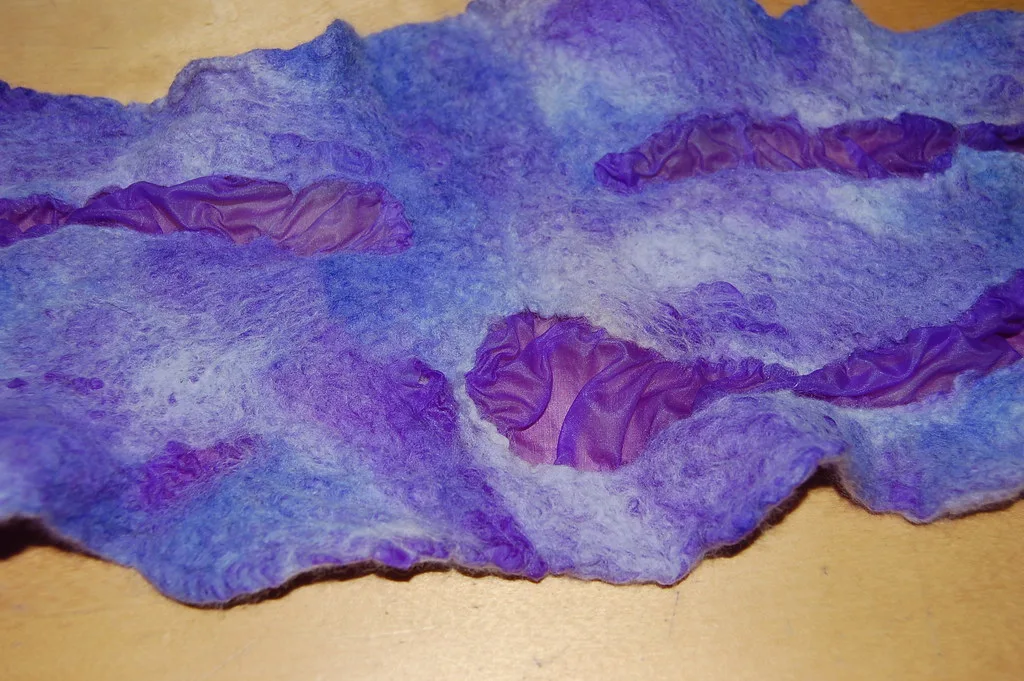 A nuno felted scarf, wool felted through fine fabric
