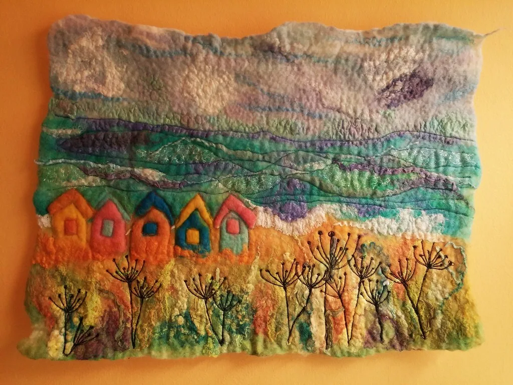 A landscape picture made from felted wool